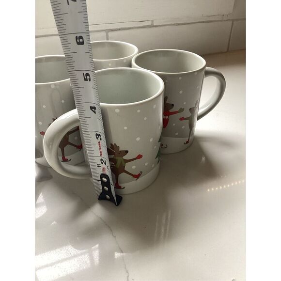 Set of 4 Crate & Barrel 12oz Ceramic Coffee Mugs Joan Anderson Skating Reindeer - Picture 6 of 7